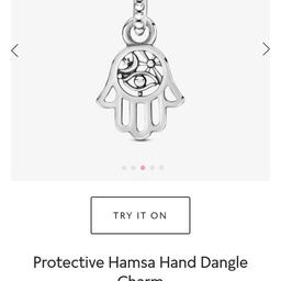 Brand new genuine Pandora Hamza Hand Charm.

This charm is still available on the Pandora website for £25.

Does not come in a box.