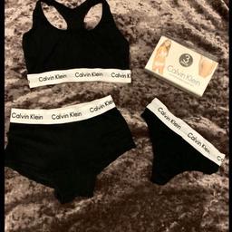 BRAND NEW IN PACK !!!

Calvin Klein 3 Piece Set Top Shorts Thong

Buister String Shorts Set

SIZE SMALL 6