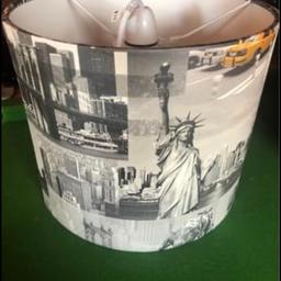 Like New New York ceiling lampshade only 2 months old.