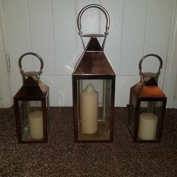 3 x copper lanterns with unused candles