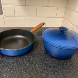 Blue Cast iron set
Been used but has so much life left in it.
There is Saucepan/fry pan and 20cm pot.
Slight crack on the saucepan wood handle, but does not affect use.
Slight damage in the pot, as can be seen on pic.
Saucepan in great condition.
Selling as I have now upgraded to le creuset cast iron pots and not enough space for storage.
Grab your self a bargain.

These are heavy, so collection preferable.
But I can post at your cost.
