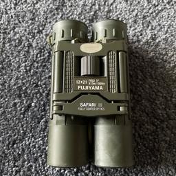 Fujiyama binoculars 12x21. Includes carry case and cleaning cloth. Is very good condition.