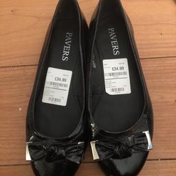 New, never worn other than to try on, black leather shoes size 7. No box sold as seen.