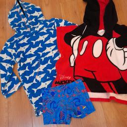 swim bundle 
speedo shorts 
john Lewis poncho towel 
Disney Mickey mouse towel 
all great condition 
postage is £3