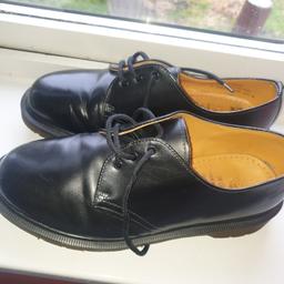 original  Dr Martens shoes .

black colour.

excellent condition. 

size 8.