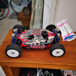 Re listing due to time wasters. Includes loads of spare parts, remote and fuel. Haven't used it for a while but was running great before. This is a seriously quick buggy. 
Collection only