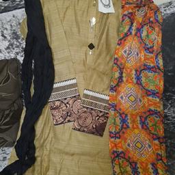 brown salwar kameez has never been worn and is still in its original packaging has the labels on it.  comes with a multicoloured trouser and a black multicoloured scarf. original clothing from Princess B. Size: S 
(message for more details if interested thanks:))
