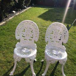 Two good condition wrought iron garden chairs £15.00 each