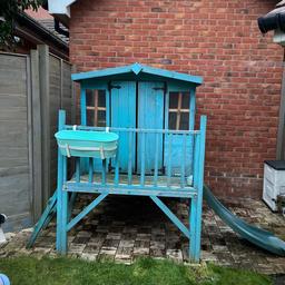 Raised platform wooden play house.
With slide and steps.
Needs sanding down and repainting.
Some damp on floor as doors have been open over the winter.
One window is smashed needs replacing - plastic window.

Please see pictures.

Buyer to collect and dismantle