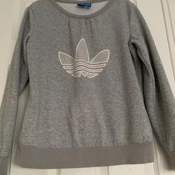 For sale Adidas jumper size 10 i good condition .