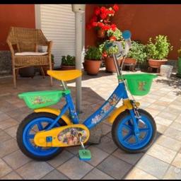 Bicicletta winnie Pooh, con rotelle incluse nel prezzo. Con 2 cestini. 