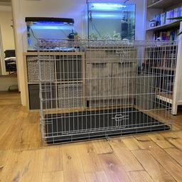 X large dog crate used a couple of times while my dog recovered from an operation, so it’s in perfect condition. It has two doors on and it’s collapsible, very strong and sturdy! 83 x 118 x 76