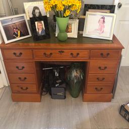 Beautiful desk with green leather effect top, light oak with, consists of 8 smaller drawers and 1 large in the middle, excellent condition, from a smoke free home