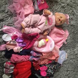 Baby born doll 
Doll clothes 
Some of the shoes and clothes will fit a my generation doll