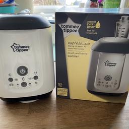 Tommee Tippee pouch and bottle warmer. In excellent working and clean condition. Like new.