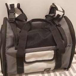 This is new and never been used.
From a smoke free home.
Has lots of pockets.
Very comfortable.
30 cm high 
21 deep
40 wide
can also collect in person.