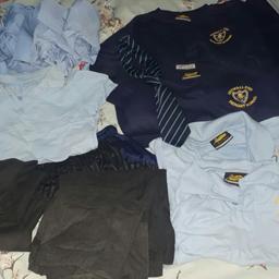 Bundle of different sized primary school uniform.Some logos "cotwall end" x2 tops plus tie and x2 polos rest are plain trousers shorts and short sleeved shirts. and 2 pe shorts one black one navy.good clean condition.some aged 8 to 9 and smaller.