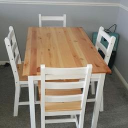 white & wooden table & 4 Chairs brought for £150.00 selling for £60.00 ONO collection only