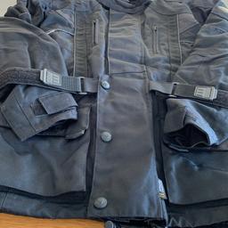 Frank Thomas motorcycle jacket removable liner fully waterproof size small no scuffs or abrasions armour on elbows excellent condition