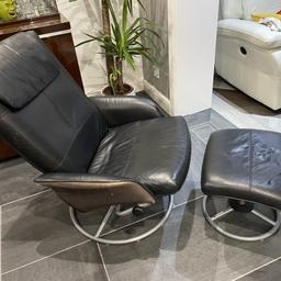 Black arm chair and foot stool. Used for couple of years.