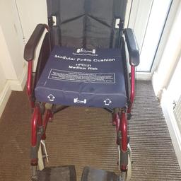 Hardly used,  foldable wheelchair with a comfy seat cushion 
can be collected or delivered locally for a small charge for petrol 
SWINTON S64 8FD