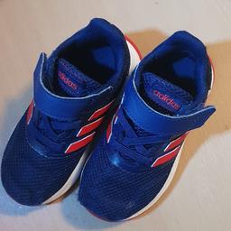 Good condition boys blue with redish orange stripes, velcro fasten Adidas trainers, good overall condition with slight scuff at front as shown in 2nd picture.

Collection welcome from Preston PR1