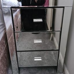 I am selling my venetian mirrored bedside table. it's like new with no cracks or scratches. no damage at all. all drawers function as it should. I have added a picture with dimensions on. bought this from dunelm 6 months ago for £199. 
collection only can deliver locally for extra.