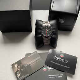 Beautiful example of mens Tag Heuer F1 swiss quartz watch, purchased after being serviced and certified, see the certificate. Boxed with all paperwork, mid-size watch 41mm case for a mid-size wrist, with not a single visible wear/tear mark on it as shown on pictures, since it was barely used. Happy buying