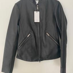 Reiss black leather jacket..size 8.brand new with tags.has 2 small marks as shown in pictures.hardly noticeable when on.bought for £325...