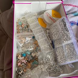 Selling my box of bracelet making stuff. Has got over 150 charms, 2 rolls of elastic, box of ring hooks, box of various size beads and extra bags of smaller beads!