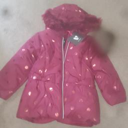 Girls coat age 4 to 5 years brand new with tags. only taken out of package for pictures.