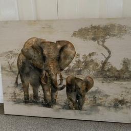 Wooden Elephant Canvas 
Within perfect condition. Selling due to decor change.
Sizes: 80cm x 61cm 

Collection from B63 area
Happy to deliver with a small additional cost
Open to offers