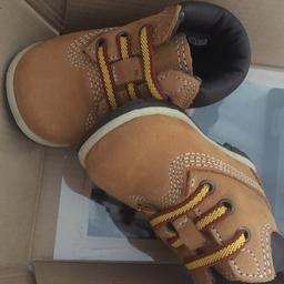 New without box 
First size 
Size 0
Unisex infant Hard sole designer boots