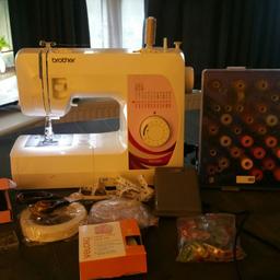 Great Brothers sewing machine with accessories, assortment of cottons bobbins,feet,fabric scissors, pins and clips,velcro,measuring tape.selling for £240 on amazon without the accessories so get yourself a bargain. could deliver for a fee if local.