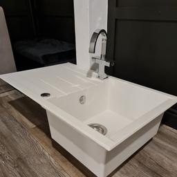 white sink with tap
used but in good condition