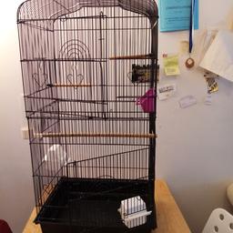 Bird cage suitable for canaries and finches with equipment as seen in pictures. Size is 92cm height, width 44cm, depth 34 cms. Buyer to collect due to size I can't post.