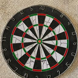 18” Professional size Dart Board
used but still in top condition 
Darks included 

Delivery available locally for fee