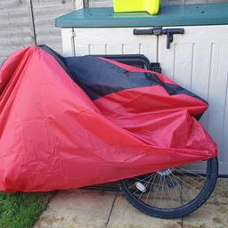 Bicycle with Shimano breaks. Rarely used with age related wear marks. Comes with red and black cover and an extra padding on seat for optimal groin protection. Might need some TLC but overall good. Better appreciated when seen.