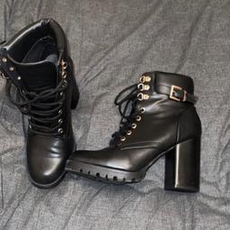 Black heeled boots in a size 7 

Gold hardware 

Brand new never worn 

Collection preferred 

Smoke free home