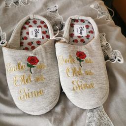 Here we have for sale a pair of brand new beauty and the beast slippers in a size 7/8 never been worn