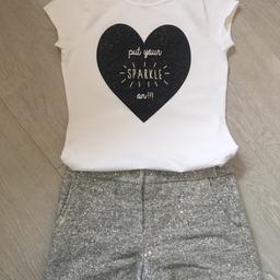 Sparkly shorts BNWT age 12-13
And white T-shirt with sparkly motif heart age 13