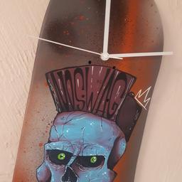 Unique and hand painted made from a skateboard