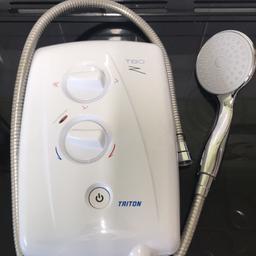 No shower pole but easy to find and cheap to buy. Comes with a brand new flow point eco water shower head. 
No scratches or damage, good as new. 

Collection only Euxton
