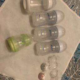 Avent & MAM 5 x bottles
2 x pacifiers (dummies) NUK

Used but good condition. I have sterilised but please sterilise again before use.

Can post for £3.10 or collect from Gants hill ig2 London
