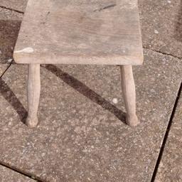 Old Wooden Stool
Size of Top 12" x 9"  1 and a quarter inch thick.
12" from floor to the top of stool.