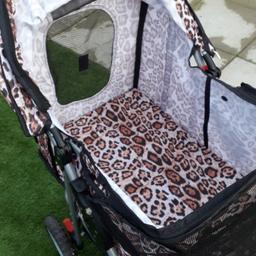 sadly I am selling a dog pushchair it's a lovely item hardly been used in a leopard pattern with a storage bag underneath so you can keep all your stuff in, it's got a hood and mesh so you can keep your eyes on your pet, it's in mint condition, collection only