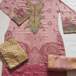 linen stuff embroidered neckline very fine stitching smooth stuff same like pictures patched daman and trousers