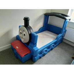 Toddler bed including mattress if wanted. Wall clock cushion soft Thomas toy 4 canvas pictures and a rug all in great condition. Open to offers.
