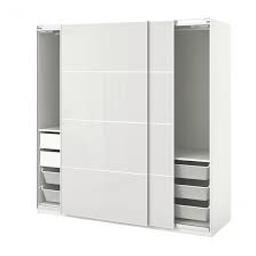 White Ikea PAX wardrobe in very good condition. Similar to the picture with white glass sliding doors.

FÄRVIK Pair of sliding doors, white glass, 200x201 cm, doors are in excellent condition, rest of wardrobe also in good condition.

Measurements:
Width: 200.0 cm
Depth: 58.0 cm
Height: 201.2 cm

Includes 2 x shelves, 2 x hanging rails and 3 rail fixings for draws. 
Note that 3 back boards are missing due to being lost during move but can be obtained from Ikea for free.
Already Dismantled.