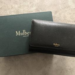 Authentic leather Mulberry purse in black. In good condition with very slight signs of wear. Complete with original packaging.